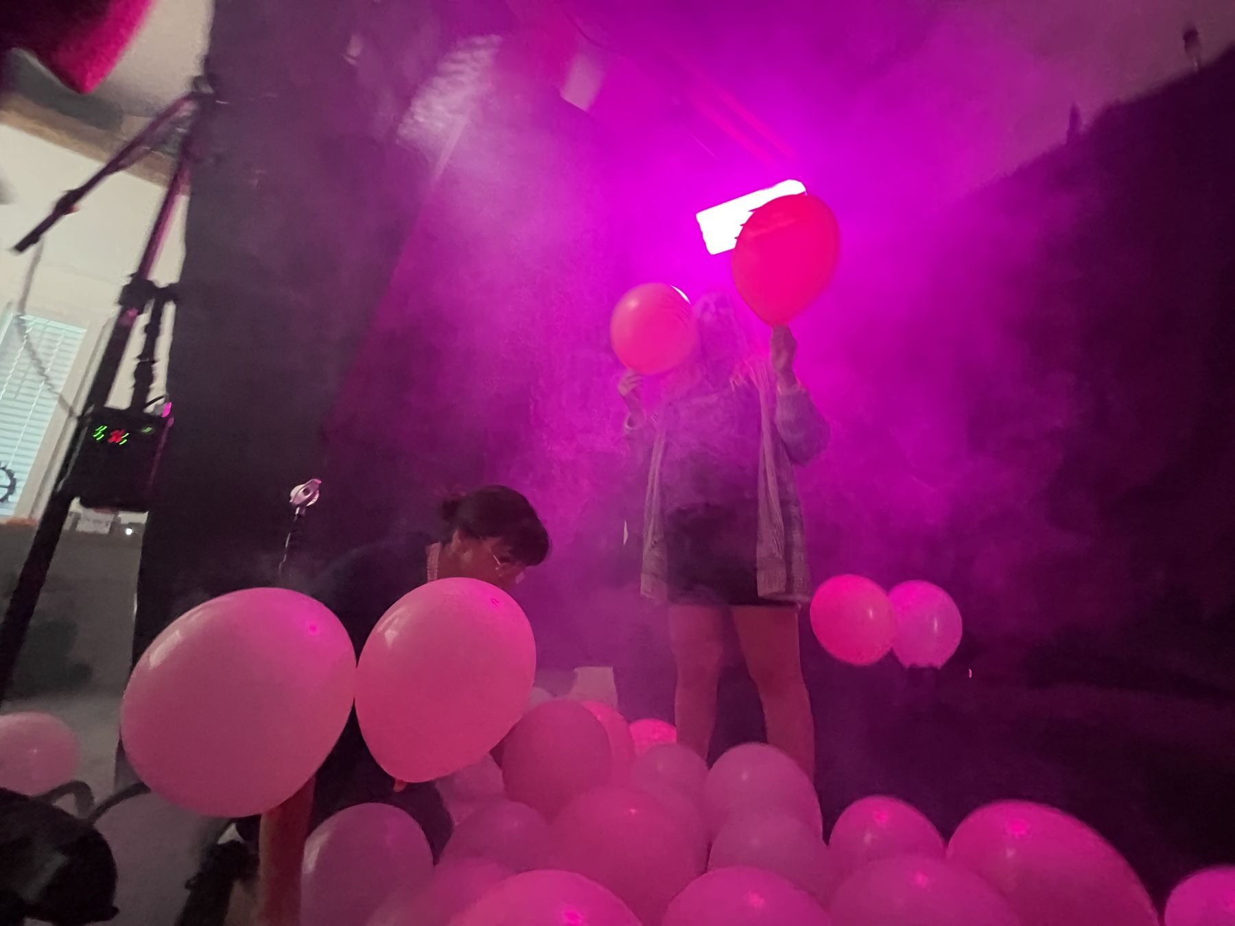 Haze and pink balloons on the set
