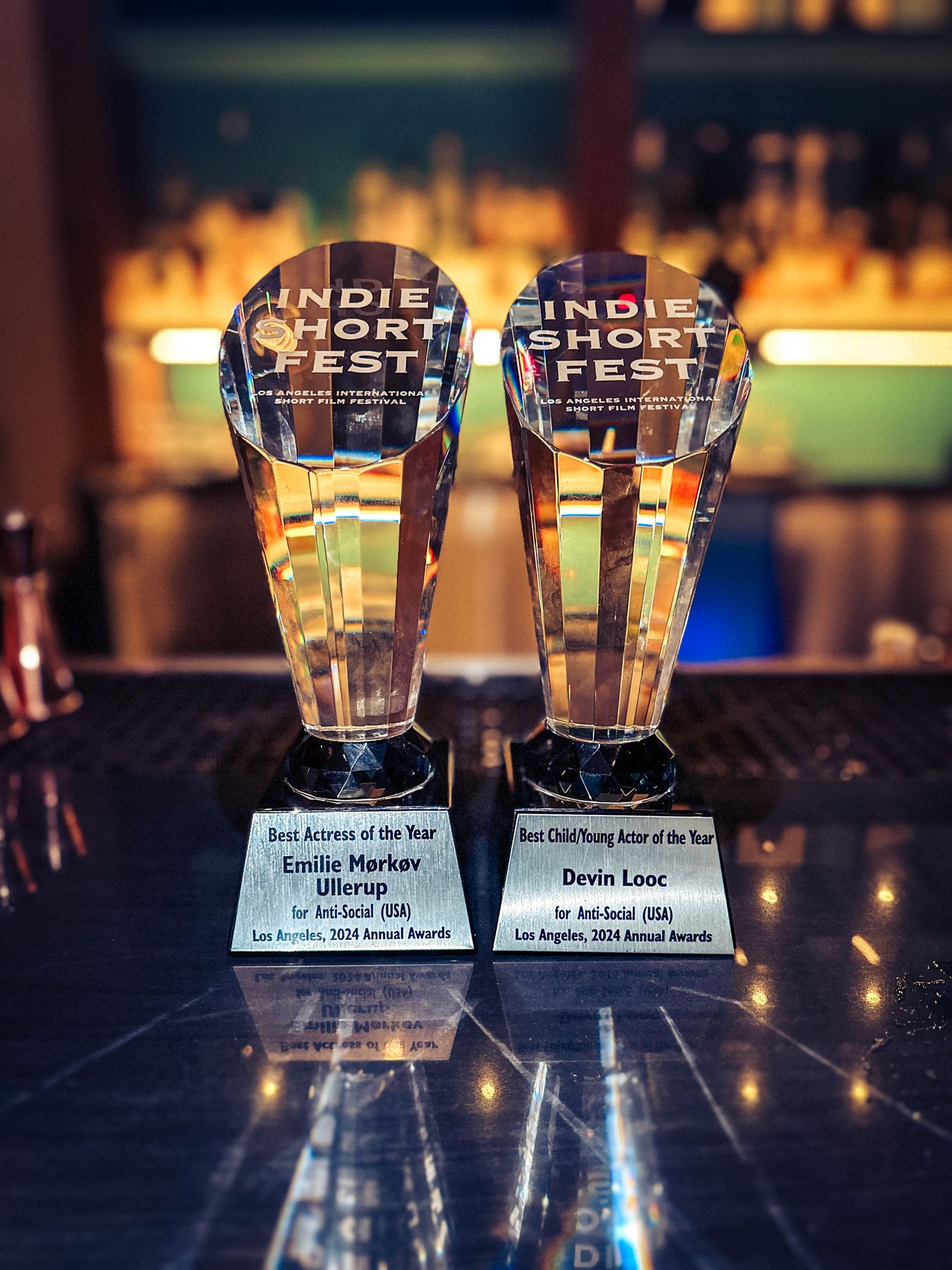 The Best Actress and Best Young Actor trophies for Emilie Ullerup and Devin Looc